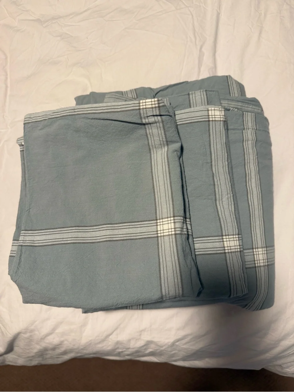 King size duvet cover. Shams. Zip closure. Light aqua blue.